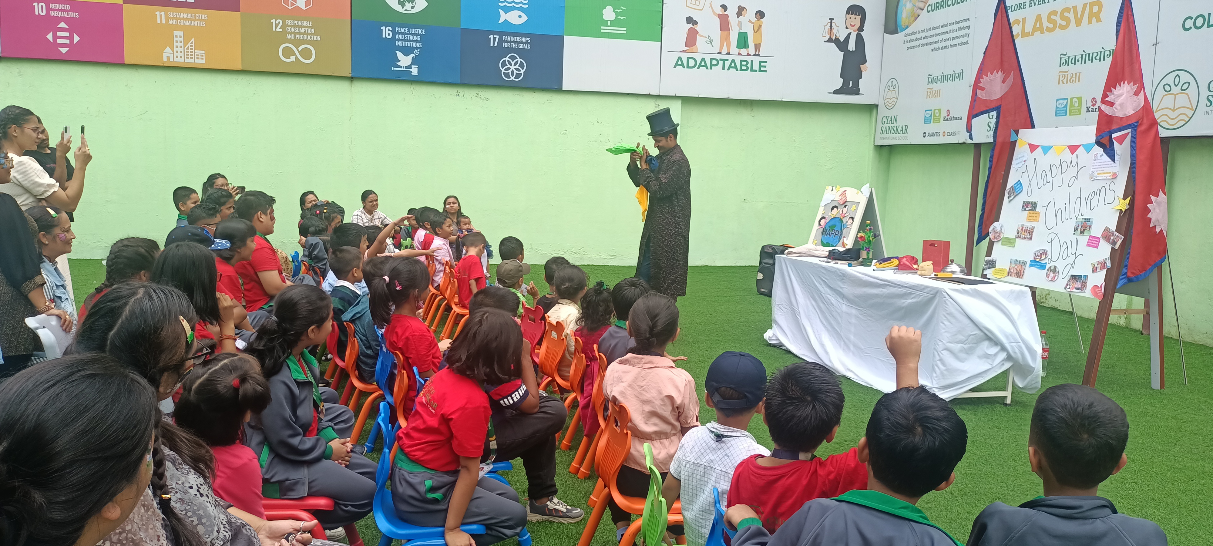 Koirala Sarkar performing for children at a school